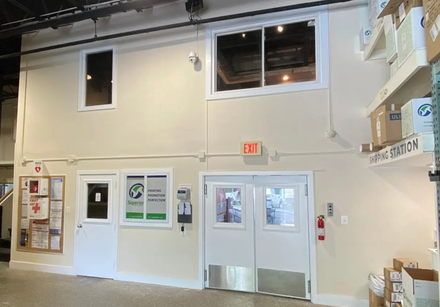 Before: commercial interior wall in a plain cream color